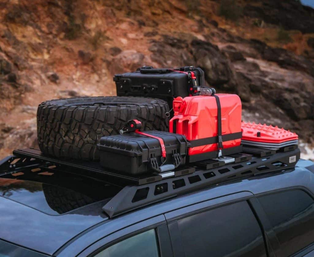 A car with a backpack on Roof Rack, ready for an adventurous journey. 